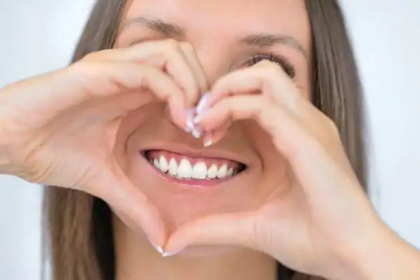 Woman happy with white smile after Blue Light Teeth Whitening Farnborough